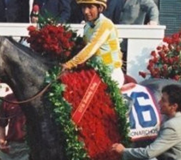Photo of a jockey on a race horse